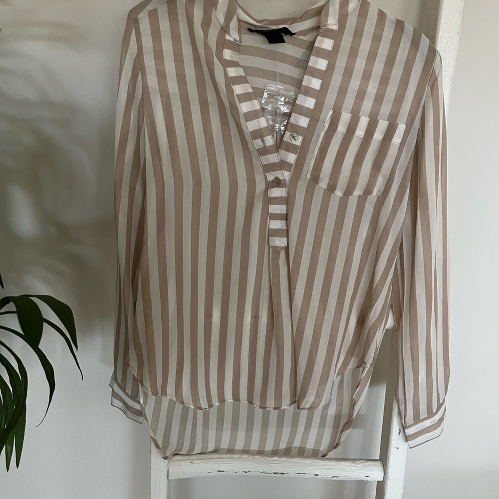 New with tags but slightly imperfect stripped blouse